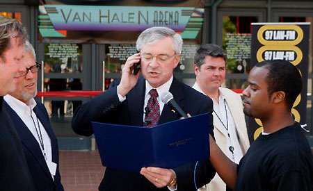 George Heartwell (the Grand Rapids mayor), in front of the Van Andel Arena, renamed it Van Halen Arena, but only for today in honor of the band's show - &copy; Press Photo / Adam Bird